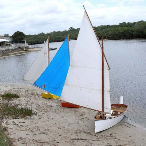 Three masts about the same size.